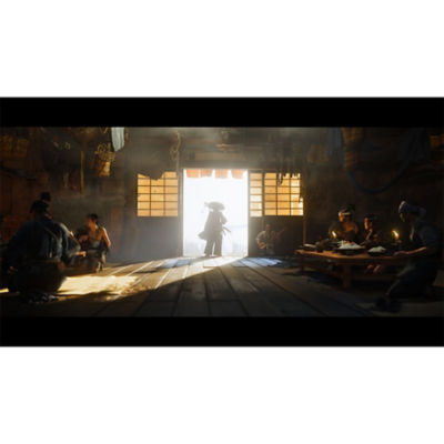 Atsu standing in the doorway of an inn