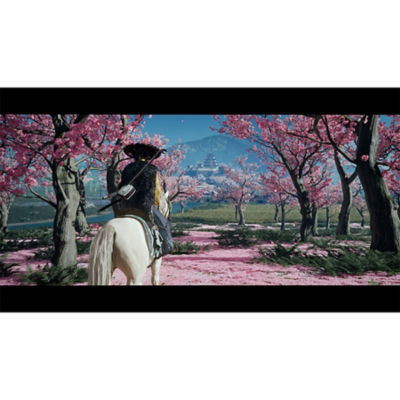 Atsu riding her horse through cherry blossoms