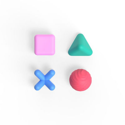 The pink square, green triangle, red circle and blue cross silicone shapes in a box formation