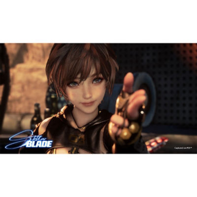 Lily che allunga la mano sinistra e indica in avanti con due dita