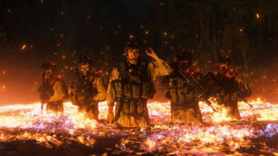 Death Stranding - Capture d'écran montrant des personnages encerclés par des flammes