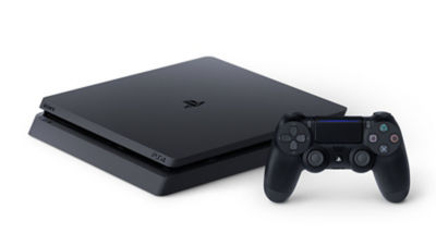 PS4 Console laying flat next to DualShock Controller