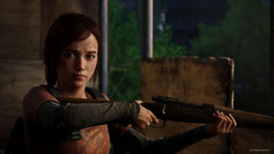 Ellie holding a rifle with both hands
