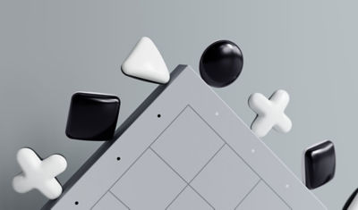 Dynamic illustration of black and white PlayStation Shapes pieces floating above a grey game board