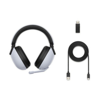 A white gaming headset alongside a black cable and black USB adaptor