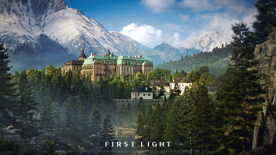 A pink hotel surrounded by a forest