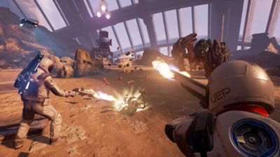 Farpoint co-op players fire their rifles at incoming alien attackers.