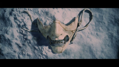 Atsu's ghost mask lying in the snow