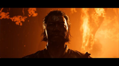 Close up of Lord Saito with fire burning in the background