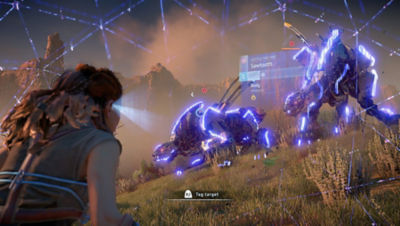 PS4 Horizon Zero Dawn Complete Edition screenshot featuring Aloy scanning a Sawtooth machine in a field